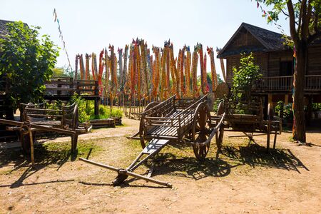 NAKHON RATCHASIMA, THAILAND - JANUARY 05, 2018: An old wooden cart in Isan Village zone in Jim Thompson Farm. Jim Thompson Farm is open only from the end of December until the beginning of January.のeditorial素材