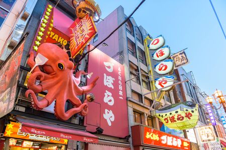 OSAKA, JAPAN - MAY 20, 2016: Many tourists walking in Dotonbori, the famous shopping street in...