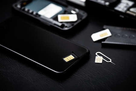 SIM card for smart phone. Changing the SIM card.の写真素材