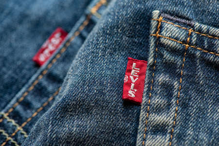 BANGKOK, THAILAND - JUNE 12, 2019: Close up of the details of Levi's Jeans. LEVI'S is a brand name of Levi Strauss and Co, founded in 1853.のeditorial素材