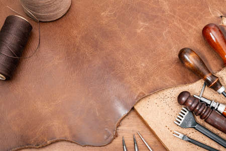 closeup details of brown leather, material for leather working.