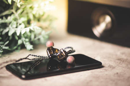 Wired earphones for smartphone and other player. Selective focus on earphone.の写真素材
