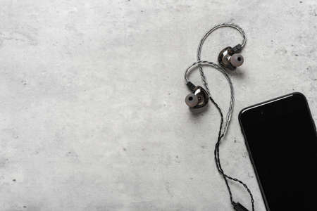 Wired earphones for smartphone and other player. Selective focus on earphone.の写真素材