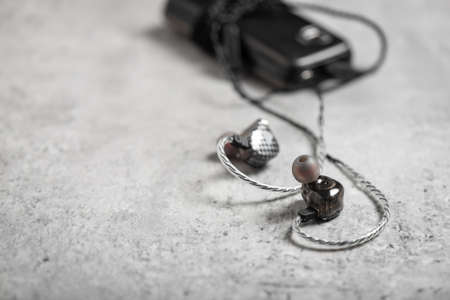 Wired earphones for smartphone and other player. Selective focus on earphone.の写真素材