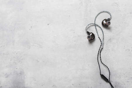 Wired earphones for smartphone and other player. Selective focus on earphone.の写真素材