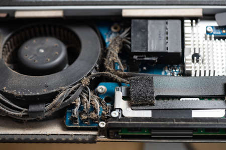 Closeup the dust inside the old computer. Computer service and repair concept.の写真素材