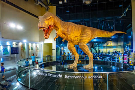 KALASIN, THAILAND - JULY 28, 2019: Siamotyrannus Isanensis sculpture display at Sirindhorn Museum, a geology museum in Sahatsakhan district, Kalasin province.のeditorial素材
