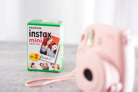 BANGKOK, THAILAND - OCTOBER 11, 2019: The box of Fujifilm Instax Mini film pack with pink Fujifilm Instax mini 8, Instax Mini is a 54 mm x 86 mm film.のeditorial素材