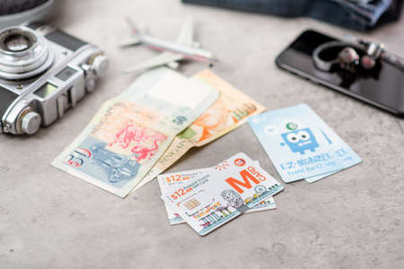 BANGKOK, THAILAND - OCTOBER 11, 2019: The EZ-Monzee card and M Card. The EZ-Monzee card is a prepaid card for travelling by bus MRT and LRT. The M Card is a prepaid SIM Card for tourist.のeditorial素材