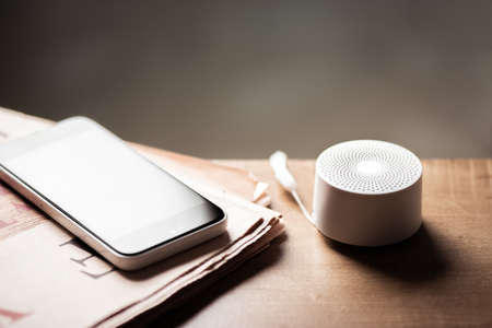 mini wireless portable speaker for music listening. Voice assistant speaker at home.の写真素材