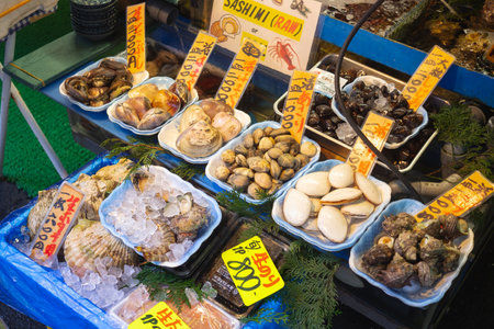 TOKYO, JAPAN - NOVEMBER 06, 2019: Fresh raw seafood in Tsukiji outer market, part of Tsukiji Market located in Tokyo, Japan.のeditorial素材