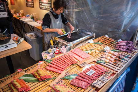 TOKYO, JAPAN - NOVEMBER 06, 2019: Wagyu beef selling in Tsukiji outer market. Wagyu or Japanese beef is any of the four Japanese breeds of beef cattle.のeditorial素材