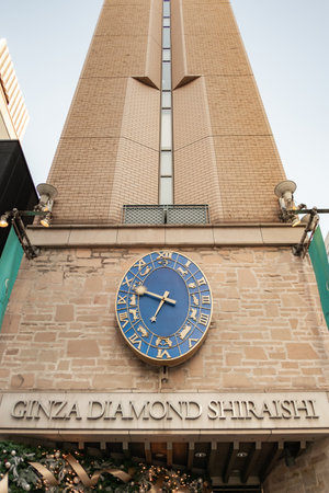 TOKYO, JAPAN - NOVEMBER 06, 2019: Zodiac wall clock at GINZA DIAMOND SHIRAISHI building in Ginza, Tokyo, Japan.のeditorial素材
