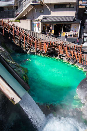 GUNMA, JAPAN - NOVEMBER 05, 2019: Yubatake Onsen, hot spring wooden boxes with mineral water in Kusatsu, Gunma, Japan. The Yubatake is used to cool down the hot spring water.のeditorial素材