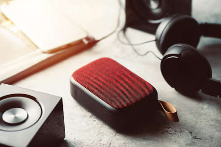 relaxing concept, close up red wireless portable speaker for music listening.の写真素材