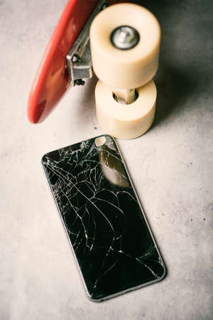 closeup cracked screen on broken smart phone.の写真素材