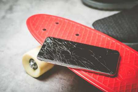 closeup cracked screen on broken smart phone.の写真素材
