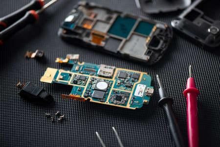 Close up small part of broken smart phone. smart phone service concept.の写真素材