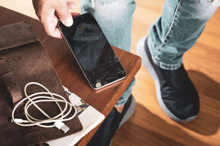 closeup cracked screen on broken smart phone.の写真素材