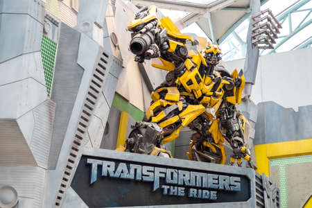 SINGAPORE - MAY 10, 2019:  The statue of Bumblebee robot
at the entrance of TRANSFORMERS THE RIDE: The Ultimate 3D Battle in Universal Studios theme park, Singapore.のeditorial素材
