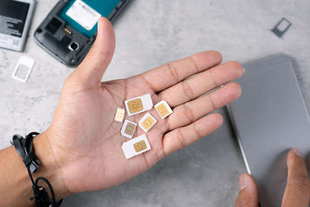 Close up SIM card for smart phone. Technology concept.