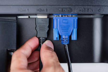 HDMI and VGA connector connected to the monitor.の写真素材