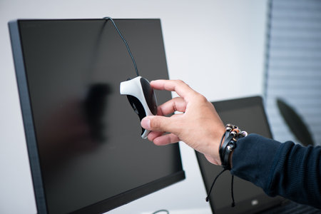 Monitor calibration by using external calibrator to ensure color is displayed correctly.の写真素材