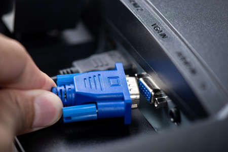 Blue VGA (Video Graphics Array) connector and cable used to transfer analog signal. This cable is...