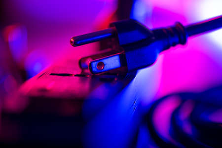Close up 3-leg plug on electrical power strip.の写真素材