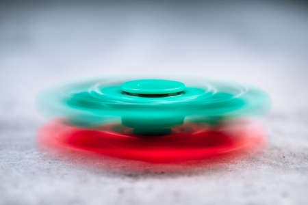 Plastic fidget spinner toy, stress and anxiety relieving toy.
