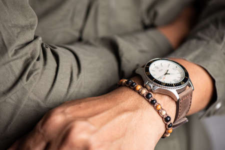 Close up bracelet on the man's wrist. Men accessories concept.の写真素材