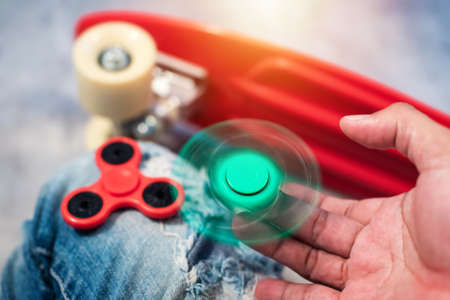 Plastic fidget spinner toy, stress and anxiety relieving toy.