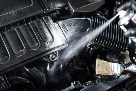 Cleaning the engine bay. Car cleaning and car detailing concept.の写真素材