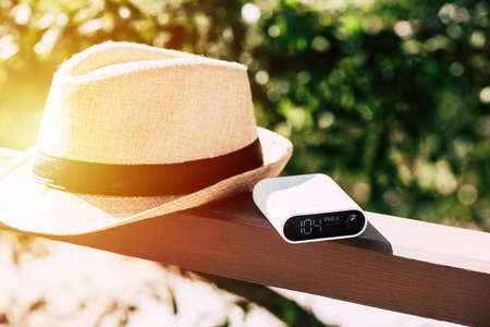 Close up portable air quality monitor detect PM 2.5, the low level is good air quality.