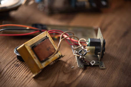 Close up diodes in diode bridge circuit connected to transformer. Bridge circuit is an arrangement of four diodes used to conversion of AC input to DC output.の写真素材