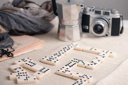 Playing Dominoes on the table (no people). Dominoes is one of the most famous classic game.