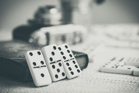Playing Dominoes on the table (no people). Dominoes is one of the most famous classic game.の写真素材