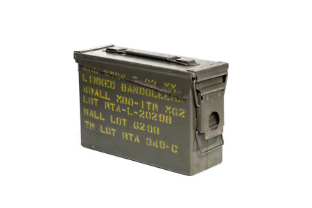 Old green ammunition box isolated over white background.の写真素材