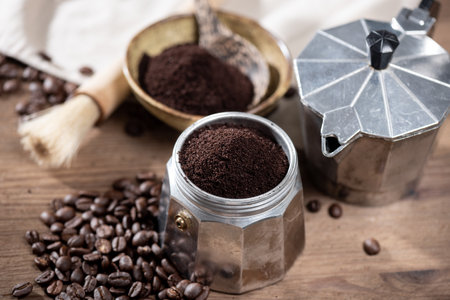 Brewing coffee with Moka pot. Moka pot is a coffee maker.の写真素材