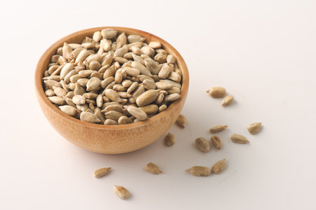Close up heap of dehulled roasted sunflower seeds.の写真素材