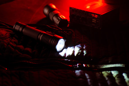 Black pocket flashlight for Everyday Carry (EDC).