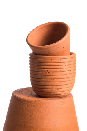 Empty orange clay flowerpot. Handmade pottery for plant.の写真素材
