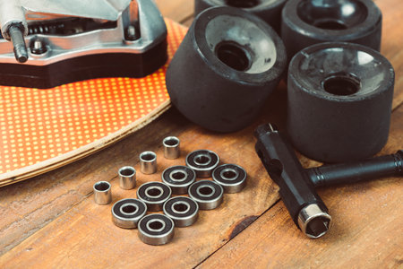 Skateboard and surfskate maintenance concept. Selective focus on the bearing.の写真素材