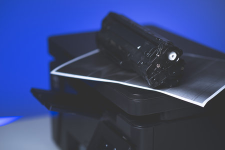 Black cartridge for laser printer. Laser printer issues concept.