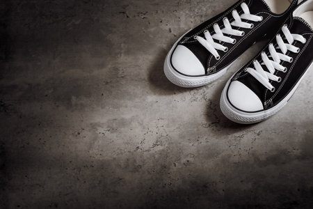 Pair of new black and white canvas sneakers.の写真素材
