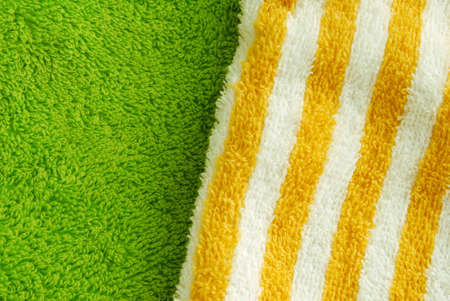 closeup image of green and striped bath towelsの写真素材