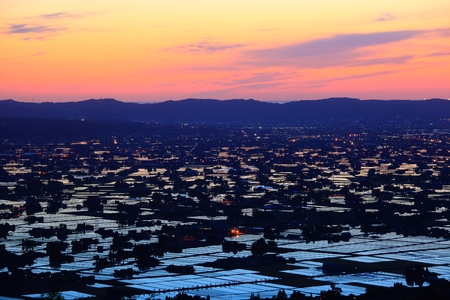 Paddy field at twilight, Nanto city, Toyama, Japanの写真素材