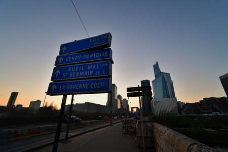 France. La DÃ©fense district at sunset as seen from the bridge "Pont de Neuilly". March 26, 2022.のeditorial素材