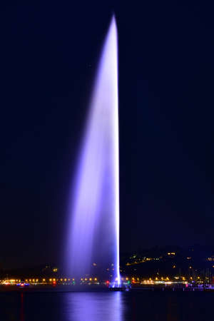 Switzerland, Geneva. Night view of the Jet d'Eau (Water-Jet) on Lake Geneva. August 15, 2022.の写真素材