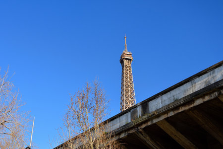 Paris, France. The Eiffel Tower seen through the wall. February 6, 2023.の写真素材